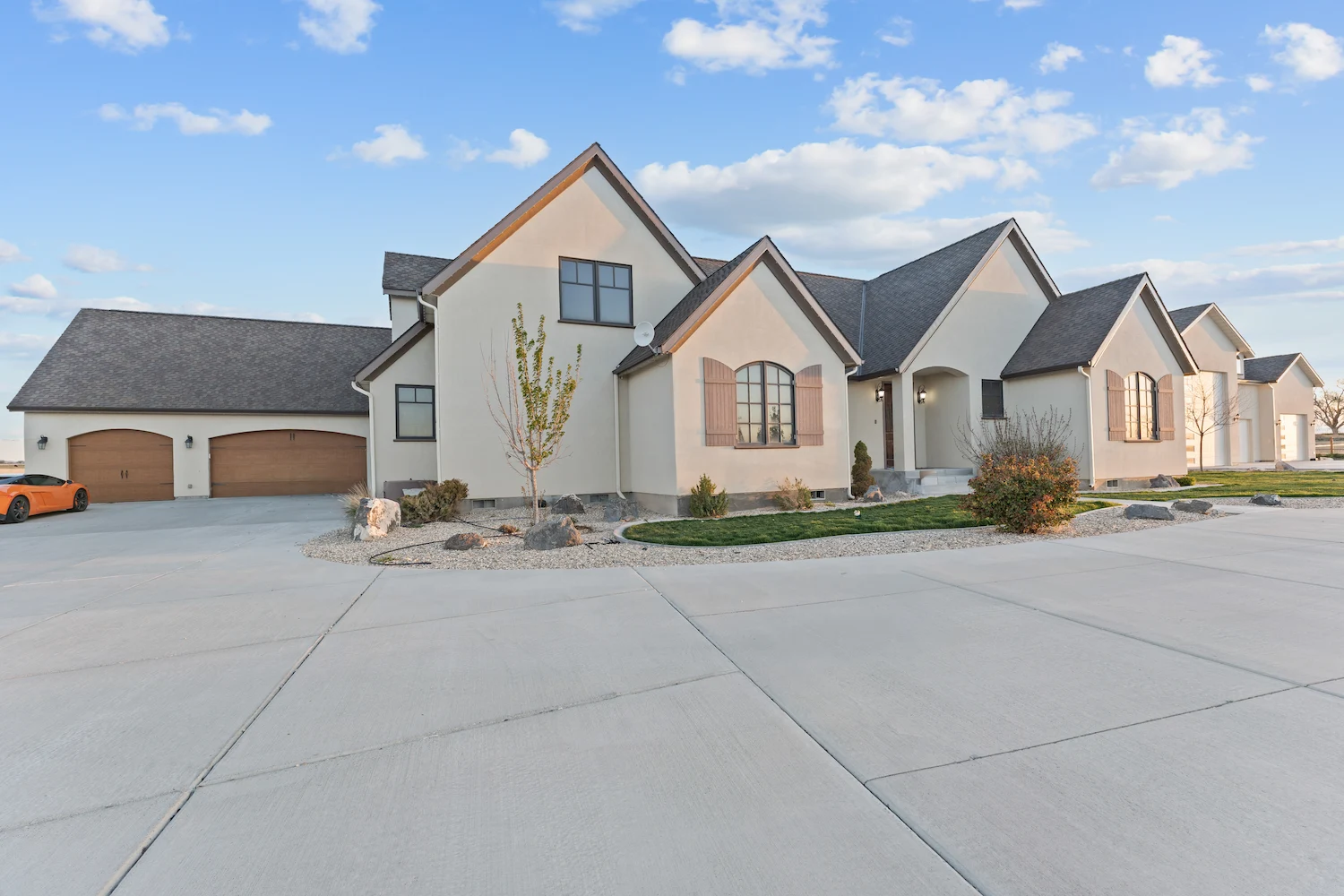 Attached garage and frontage by day