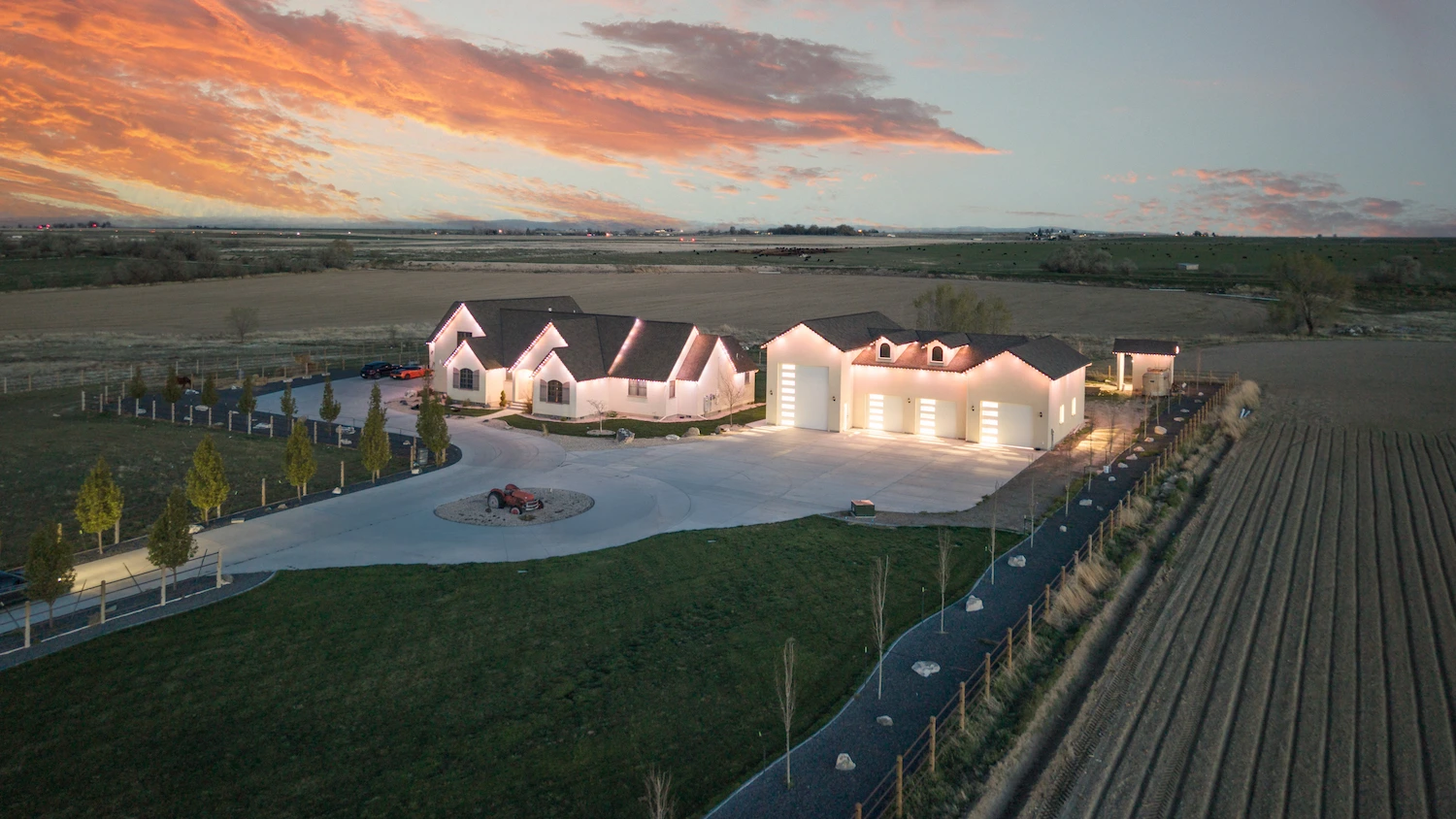 The whole property from above at dusk