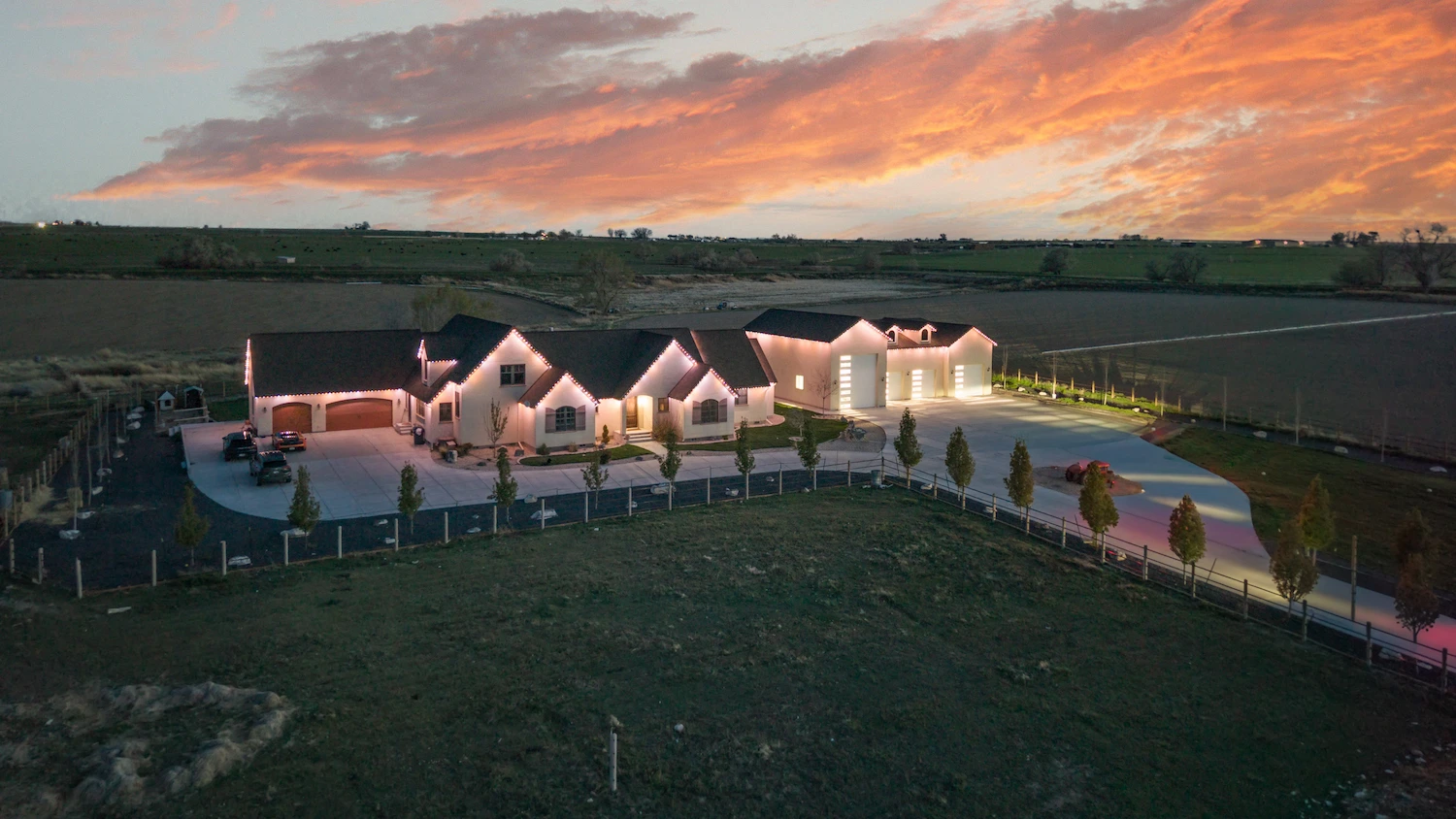 Aerial view across the lit property